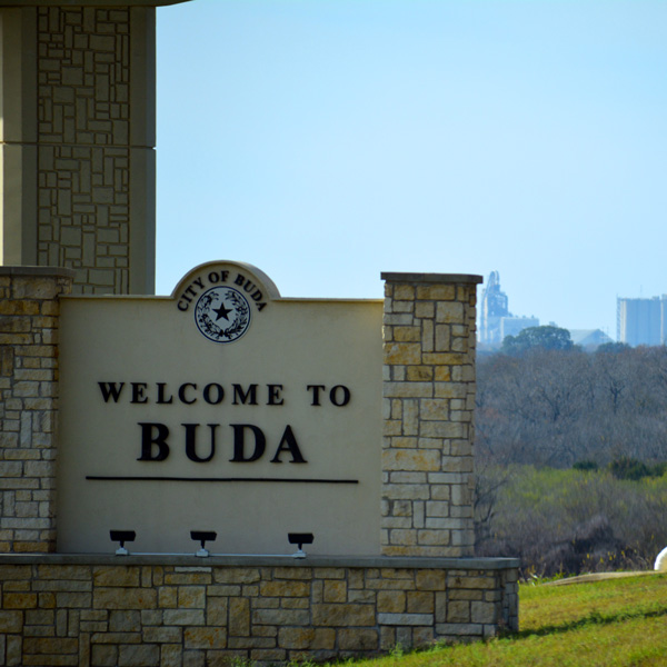 Welcome to Buda sign