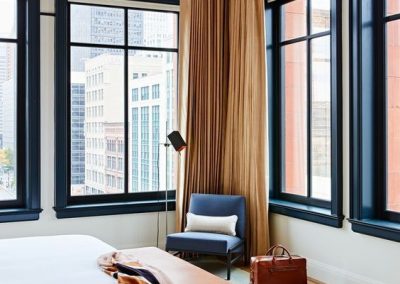 Arch Window Master Bedroom with Orange Linen in Austin